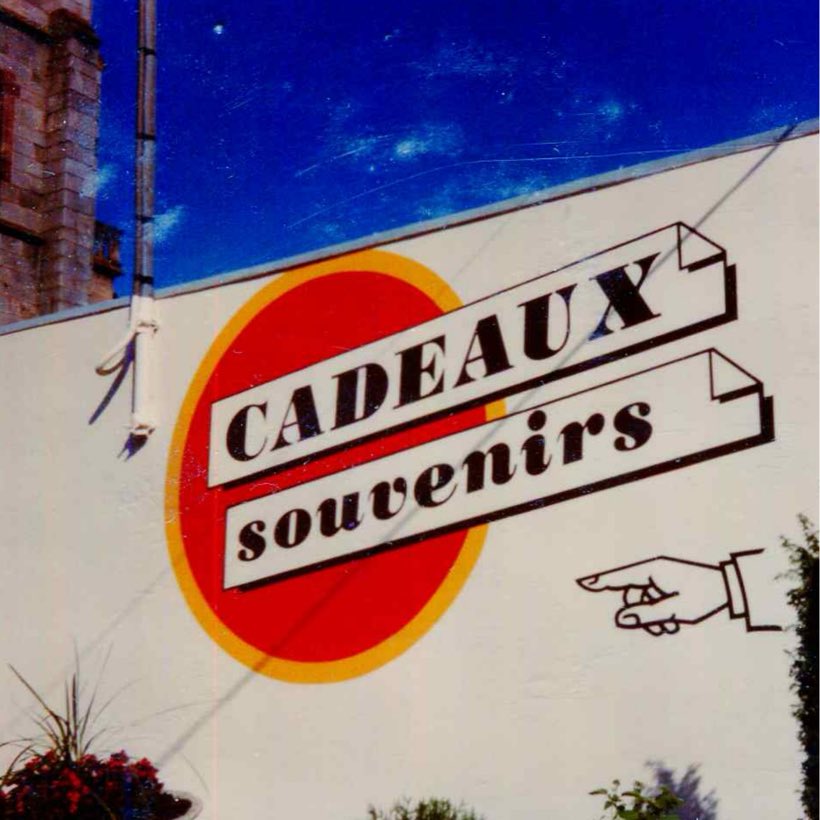 Cadeaux, souvenirs, Panneau peint, main pointée